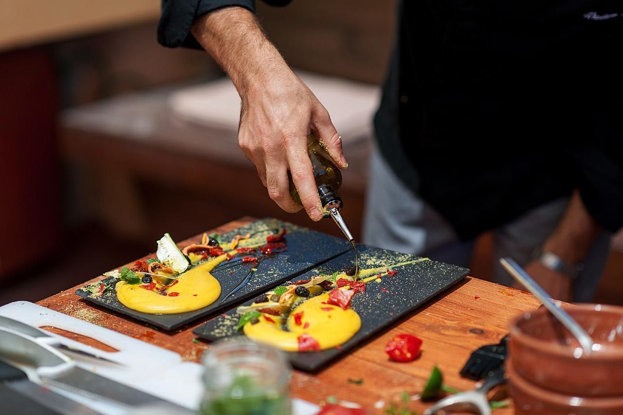 Plating fava with olive oil