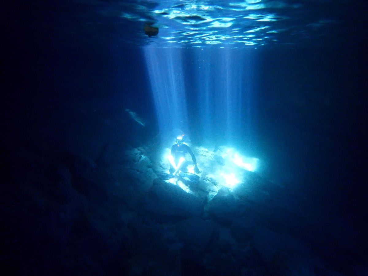 Shafts of light through the cave roof