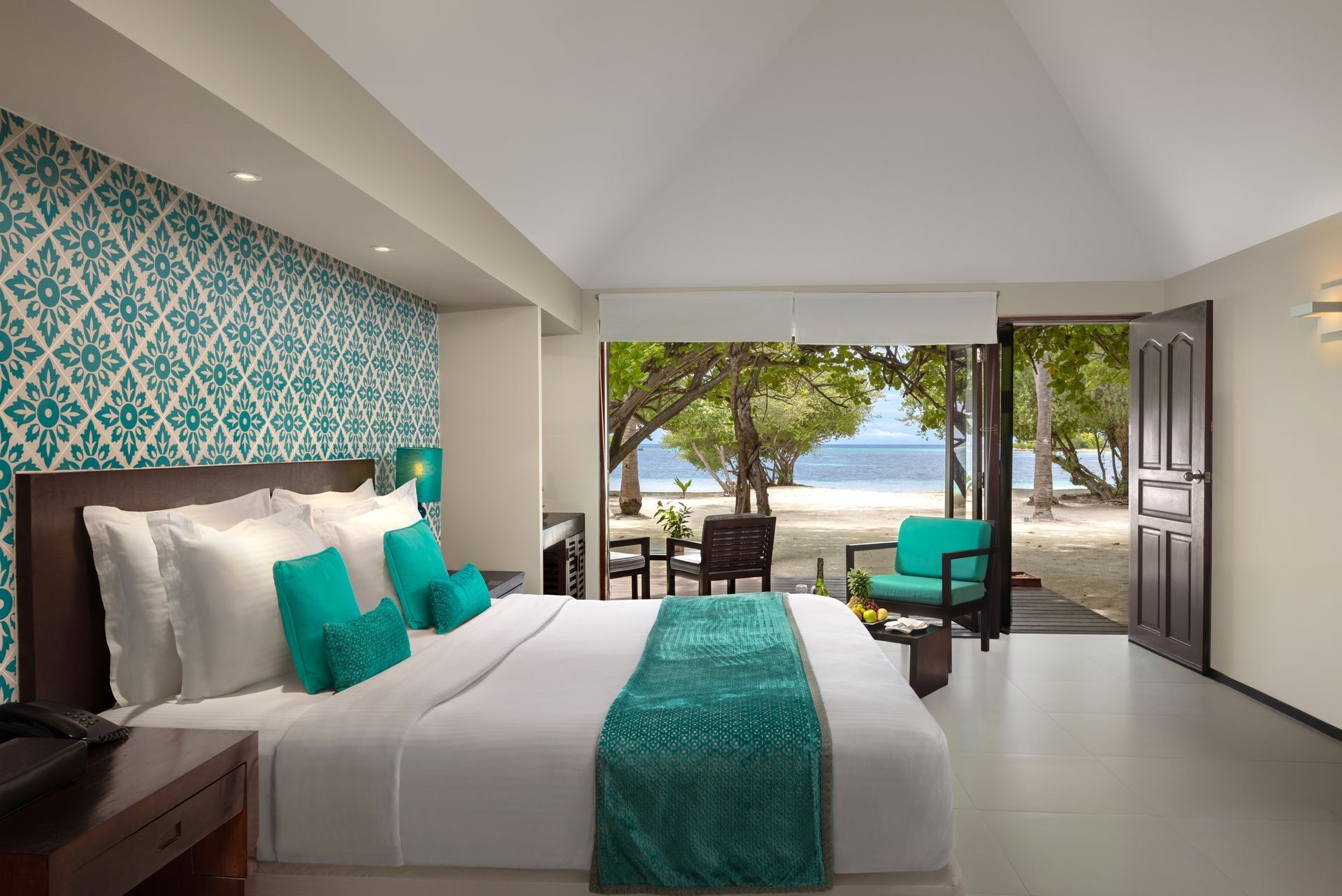 Beach Villa bedroom opening onto the sand