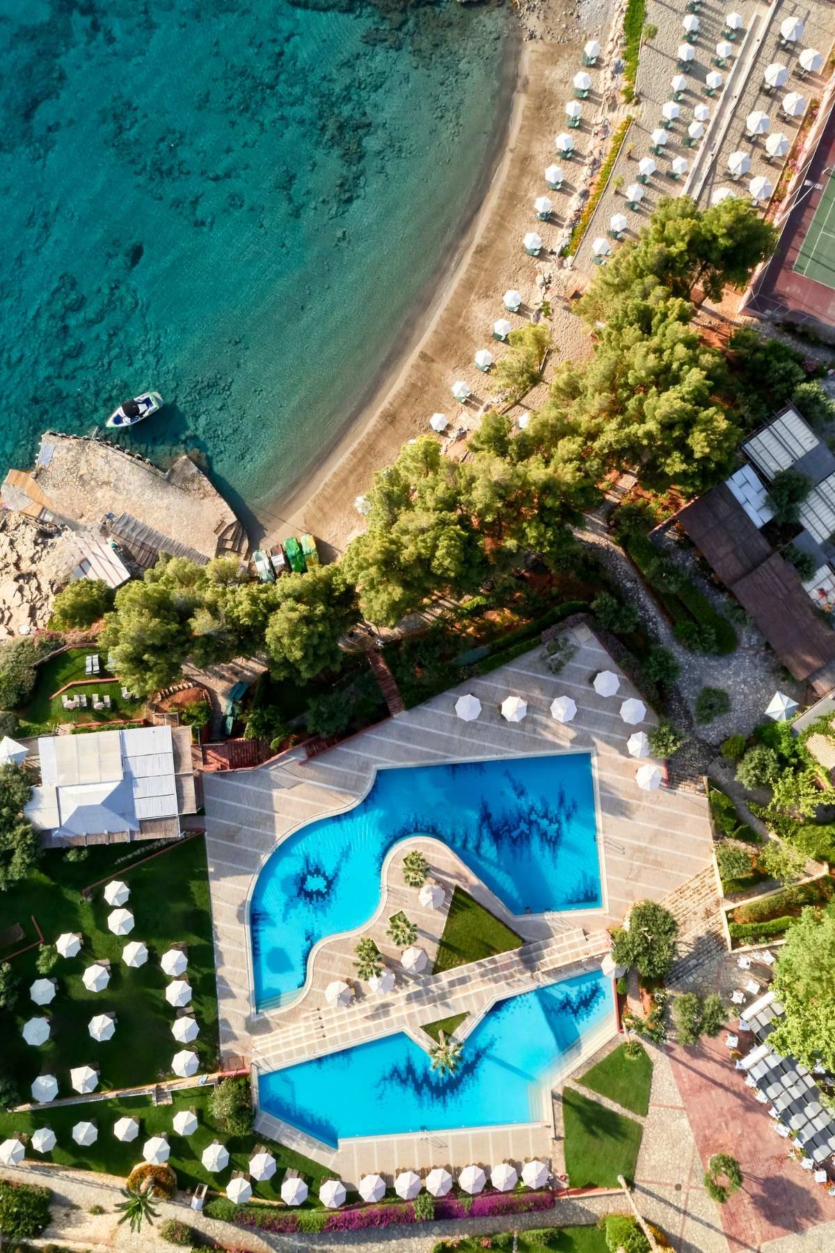 Aerial view of the pool and sandy beach
