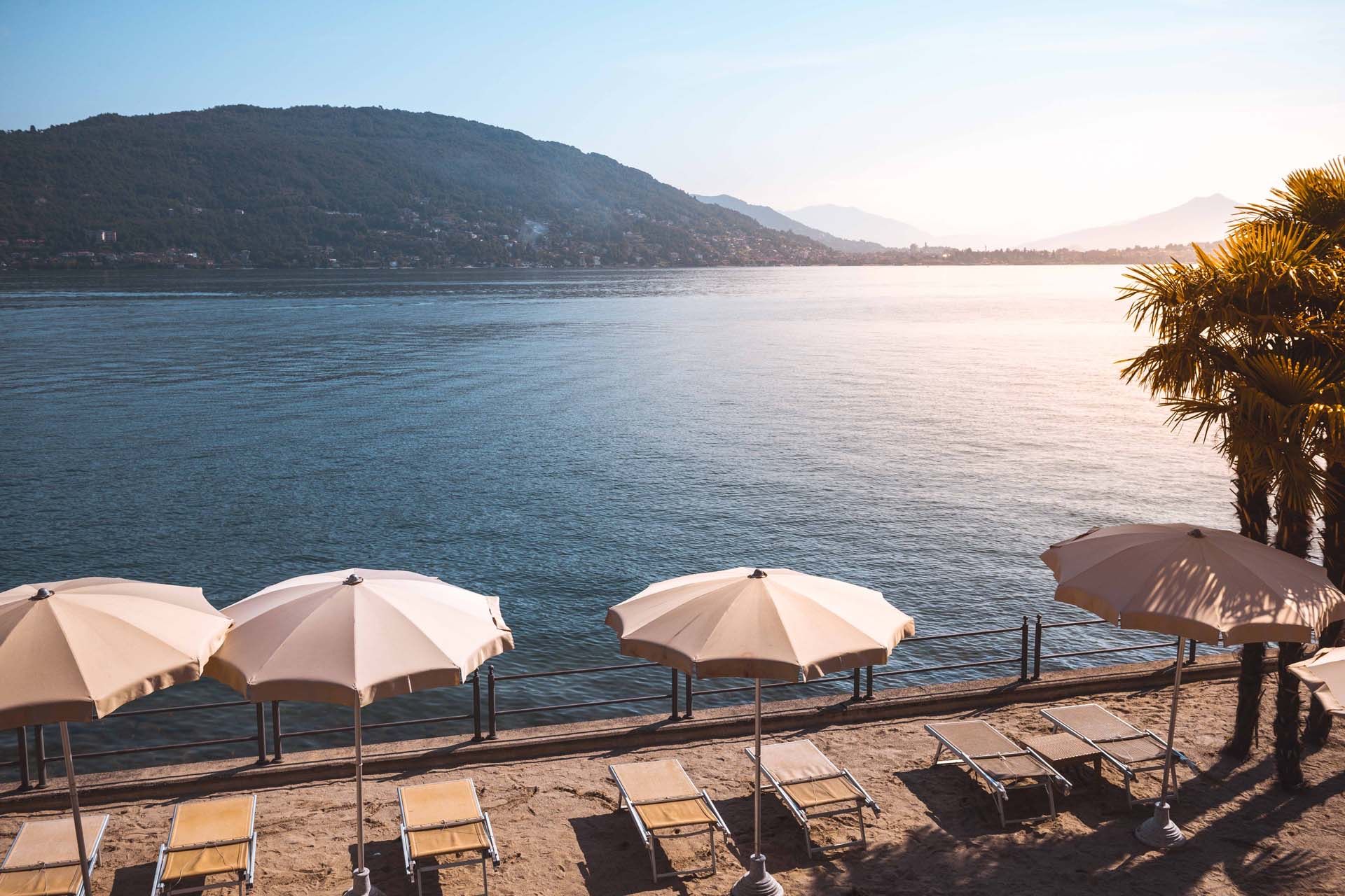 Beach umbrellas facing the lake