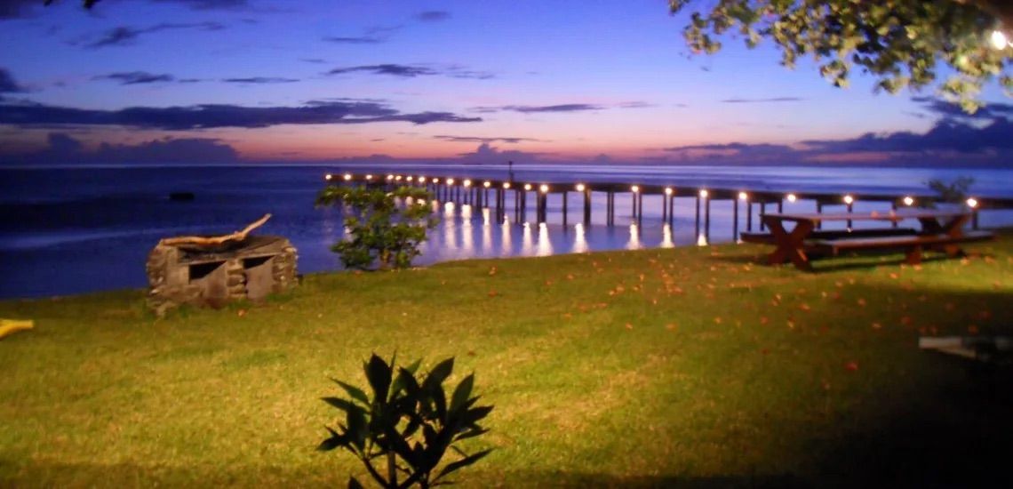The pontoon lit up at dusk