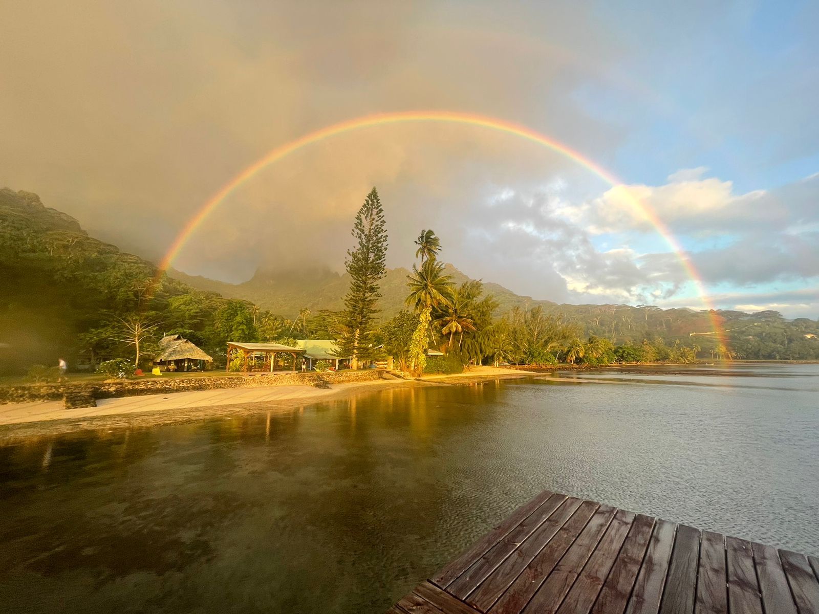 Rainbow over the lagoon and jetty