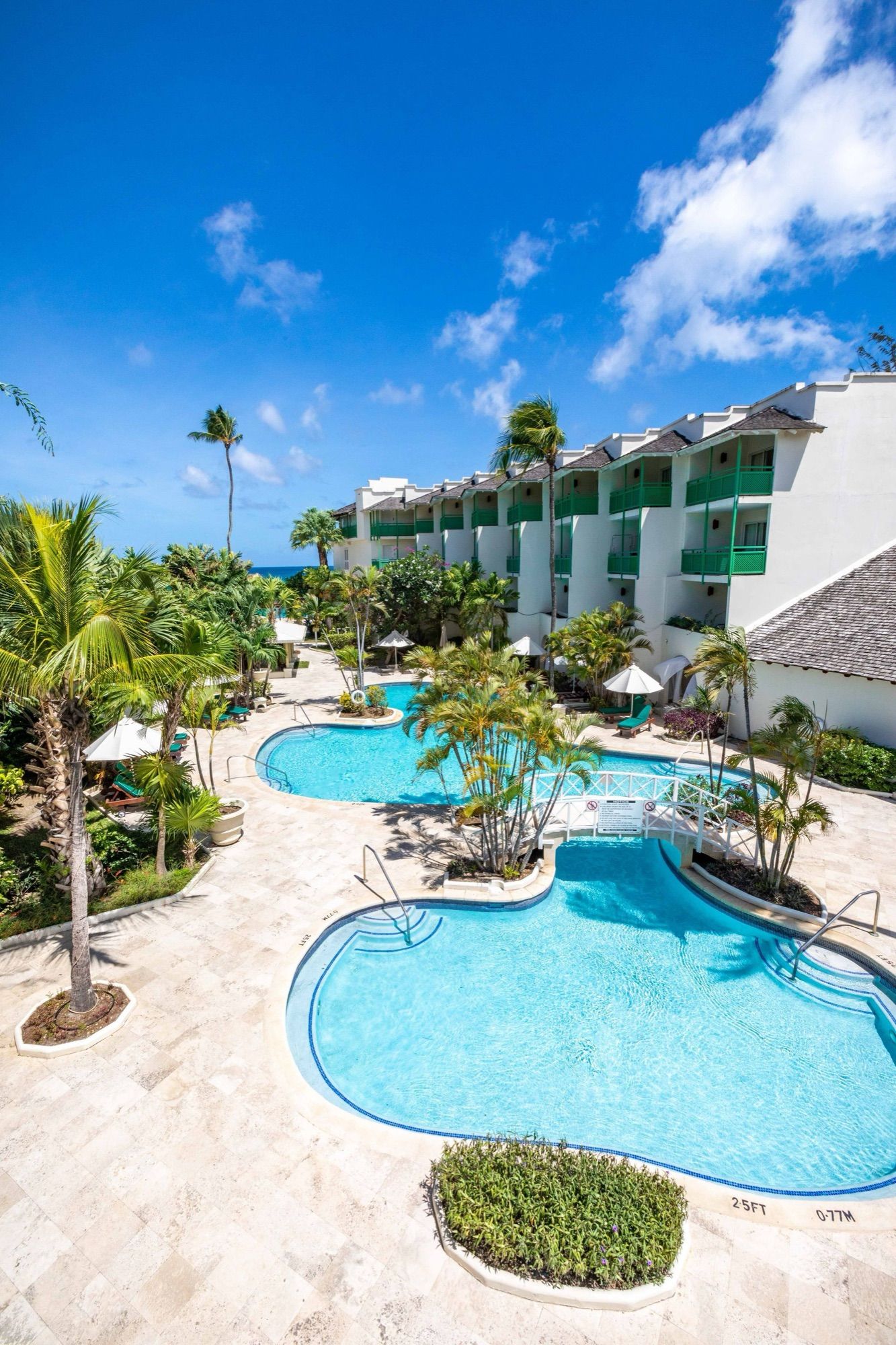 Swimming pool and gardens at Mango Bay