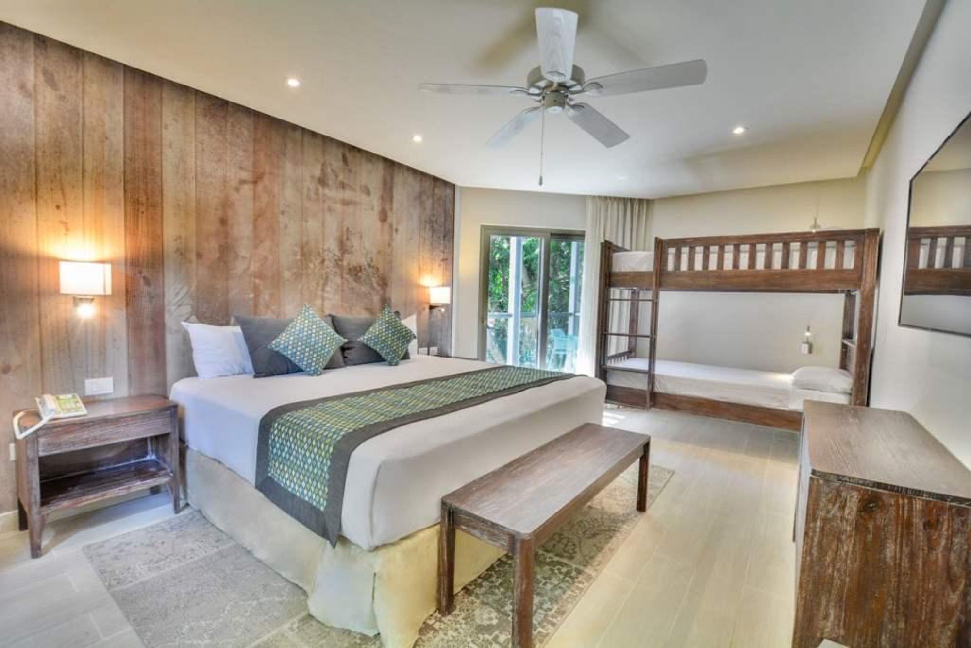 Family room with a double bed and bunk beds