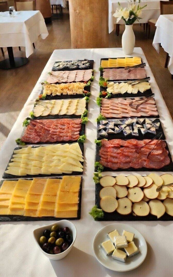 Breakfast buffet of cheeses and cold meats