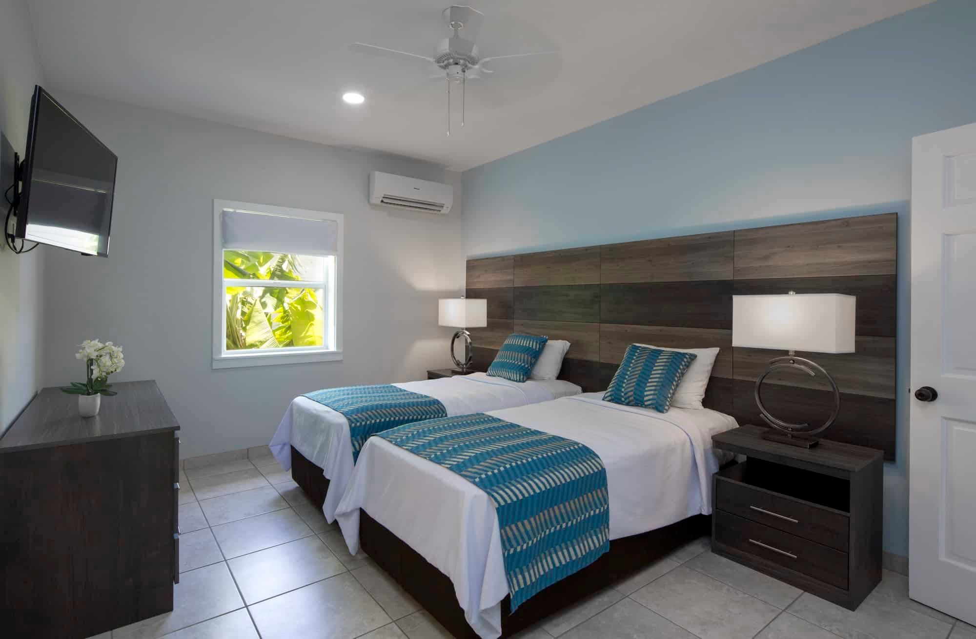 Twin bedroom in a two-bedroom villa