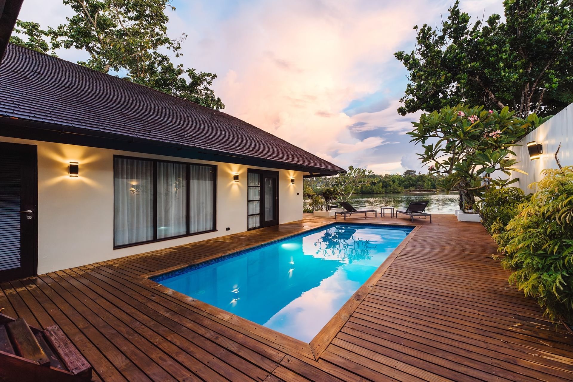 Villa deck with a private plunge pool at dusk