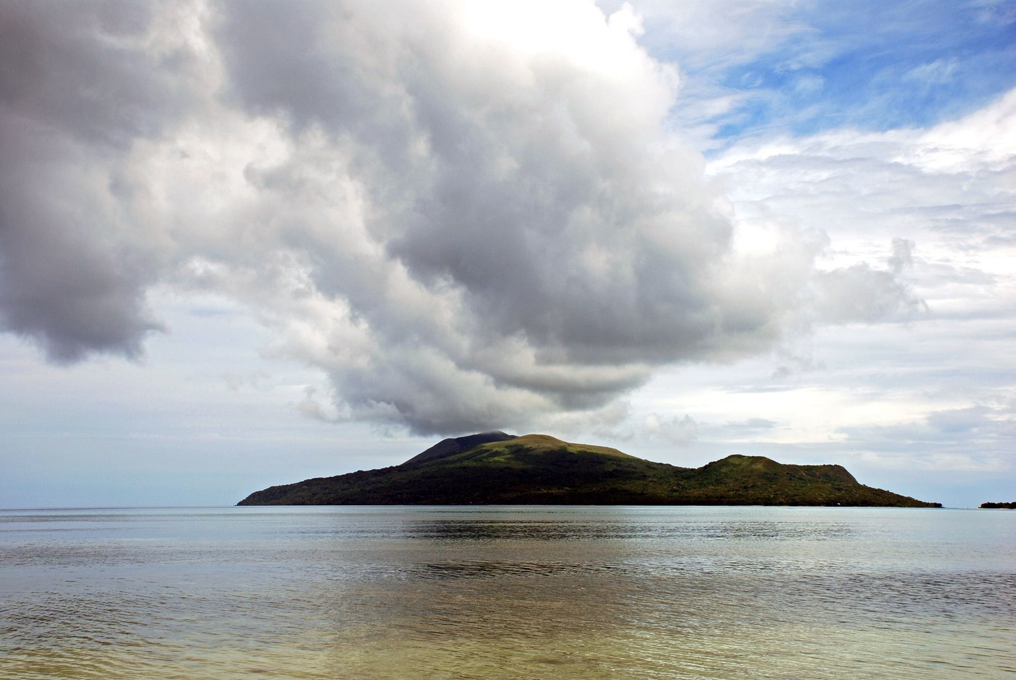 Nguna Island under a towering cloud