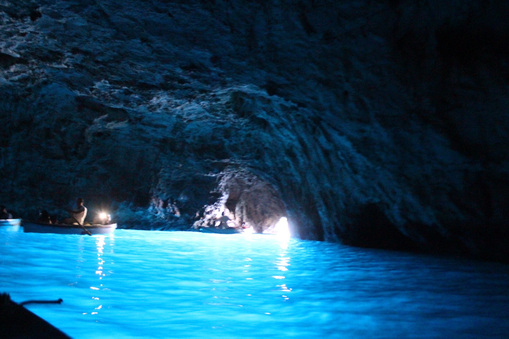 Rowing boats inside Capri's Blue Grotto