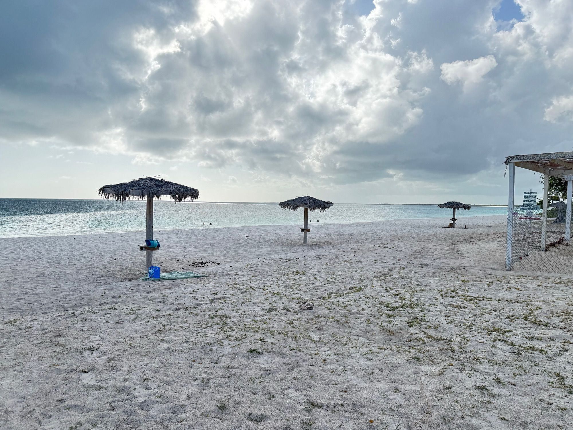 Palm-thatched umbrellas on Princess Diana Beach, Barbuda