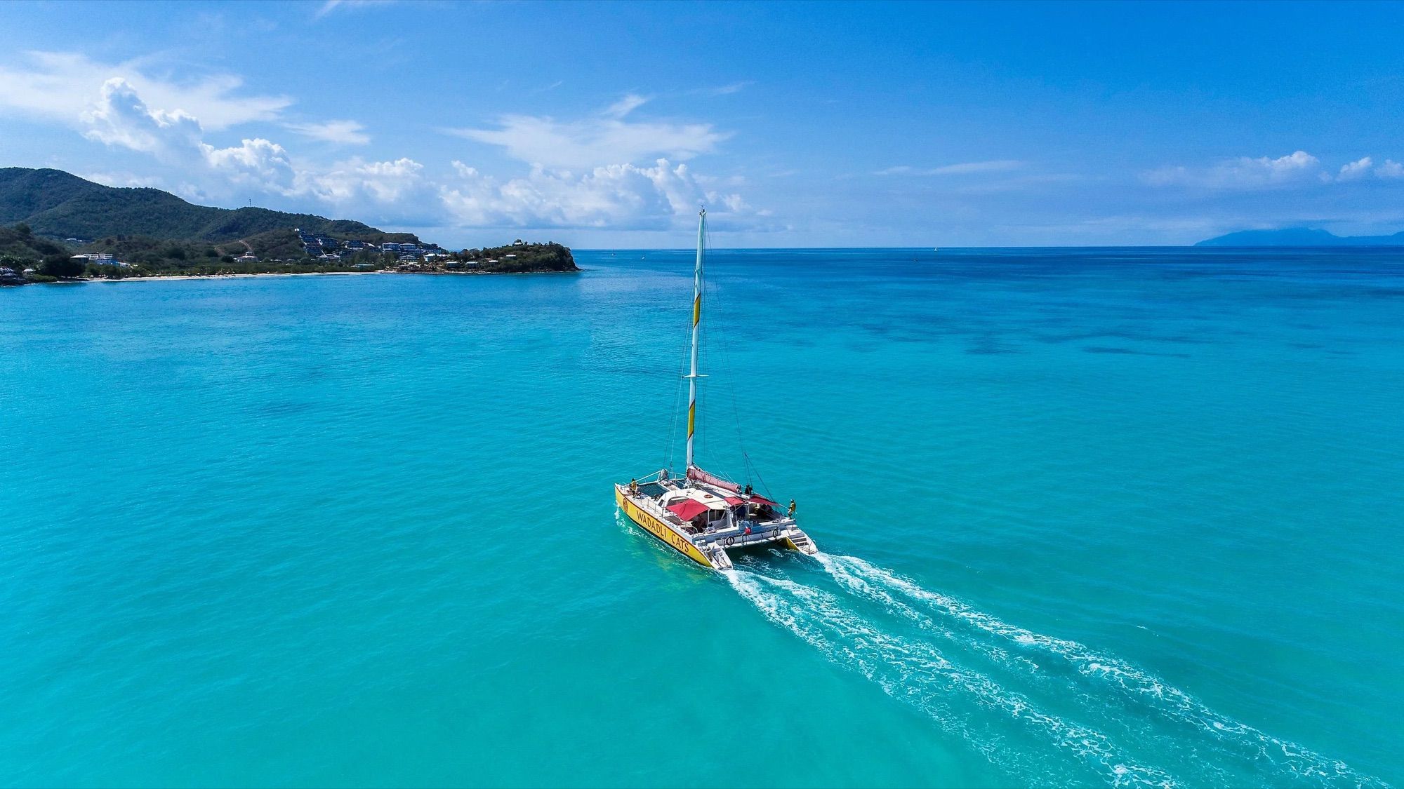 Round-the-island catamaran cruise with Green Island lunch