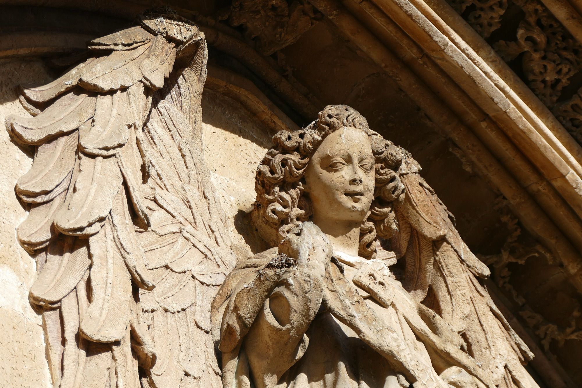 Carved stone angel over the doorway of La Llotja, Palma