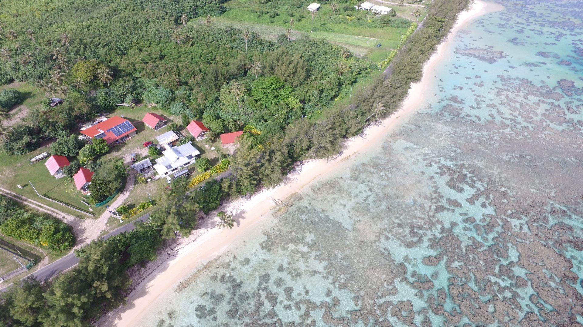 Coastline and reef of Tubuai from the air